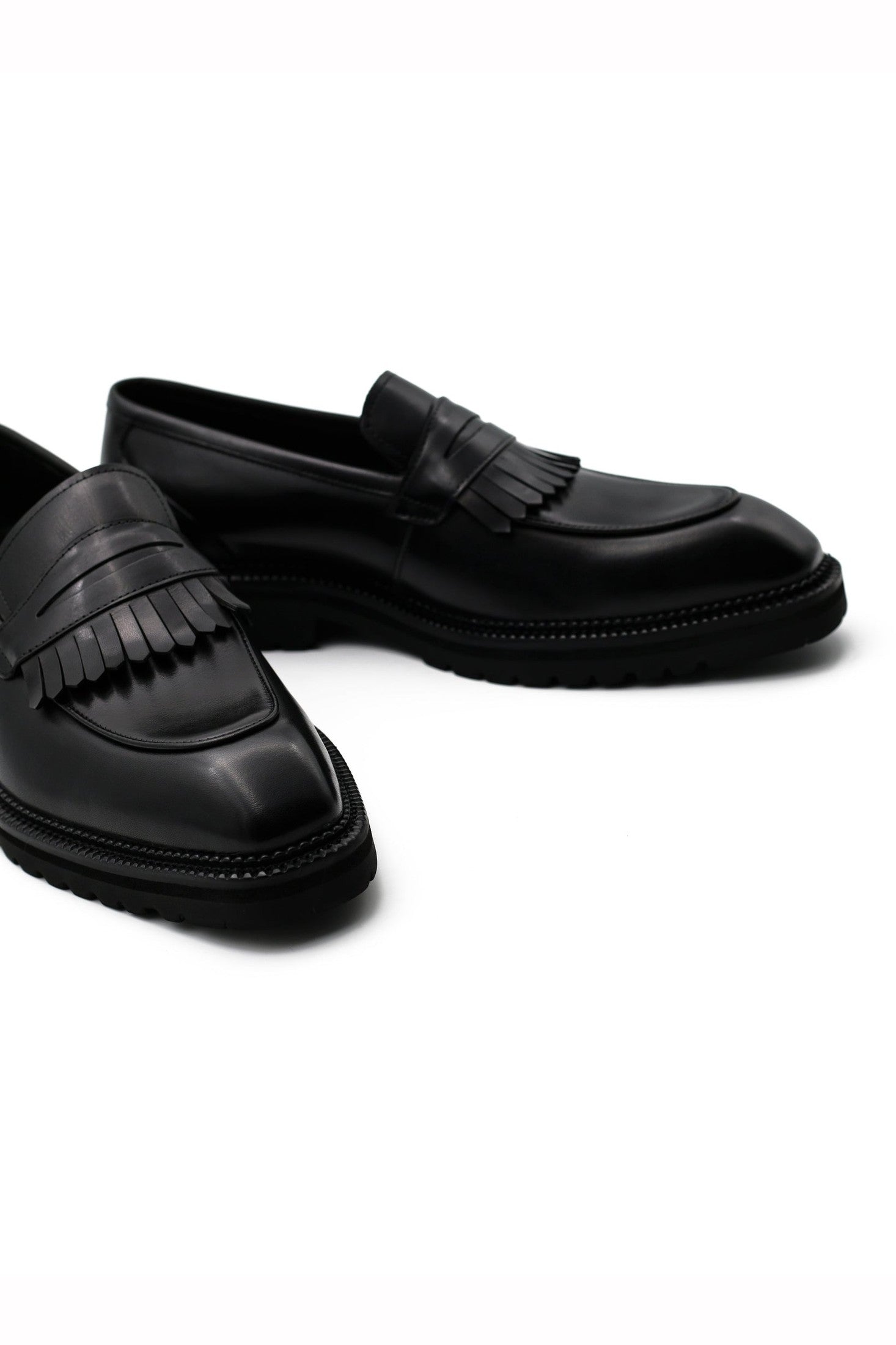 BLACK LEATHER PENNY LOAFERS WITH FRINGE